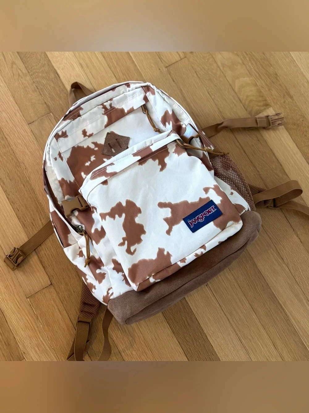cow print jansport backpack Wrangler Open pockets on each side Cow Print Backpack | Women's